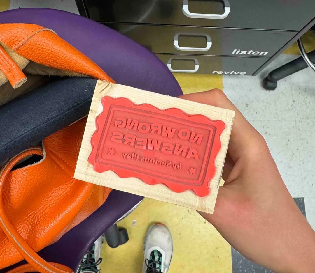 rubber stamp with no wrong answers logo