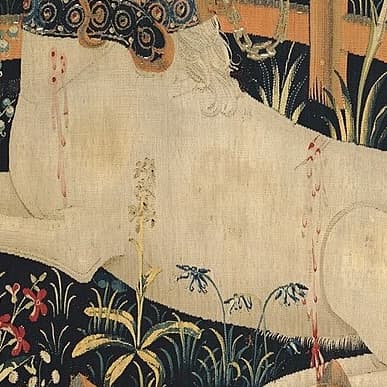 detail view of red droplets running down the neck and hind of the unicorn in the tapestry